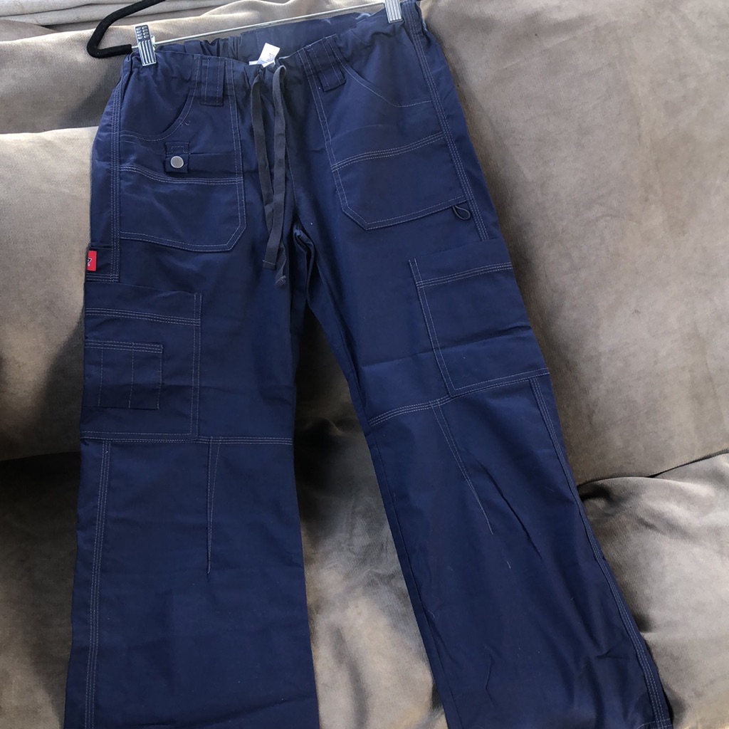 Navy blue cargo trousers with a drawcord waist and patch pockets